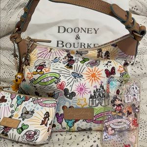 Disney Parks Dooney and Bourke  sketch hobo. Barely used mint!!